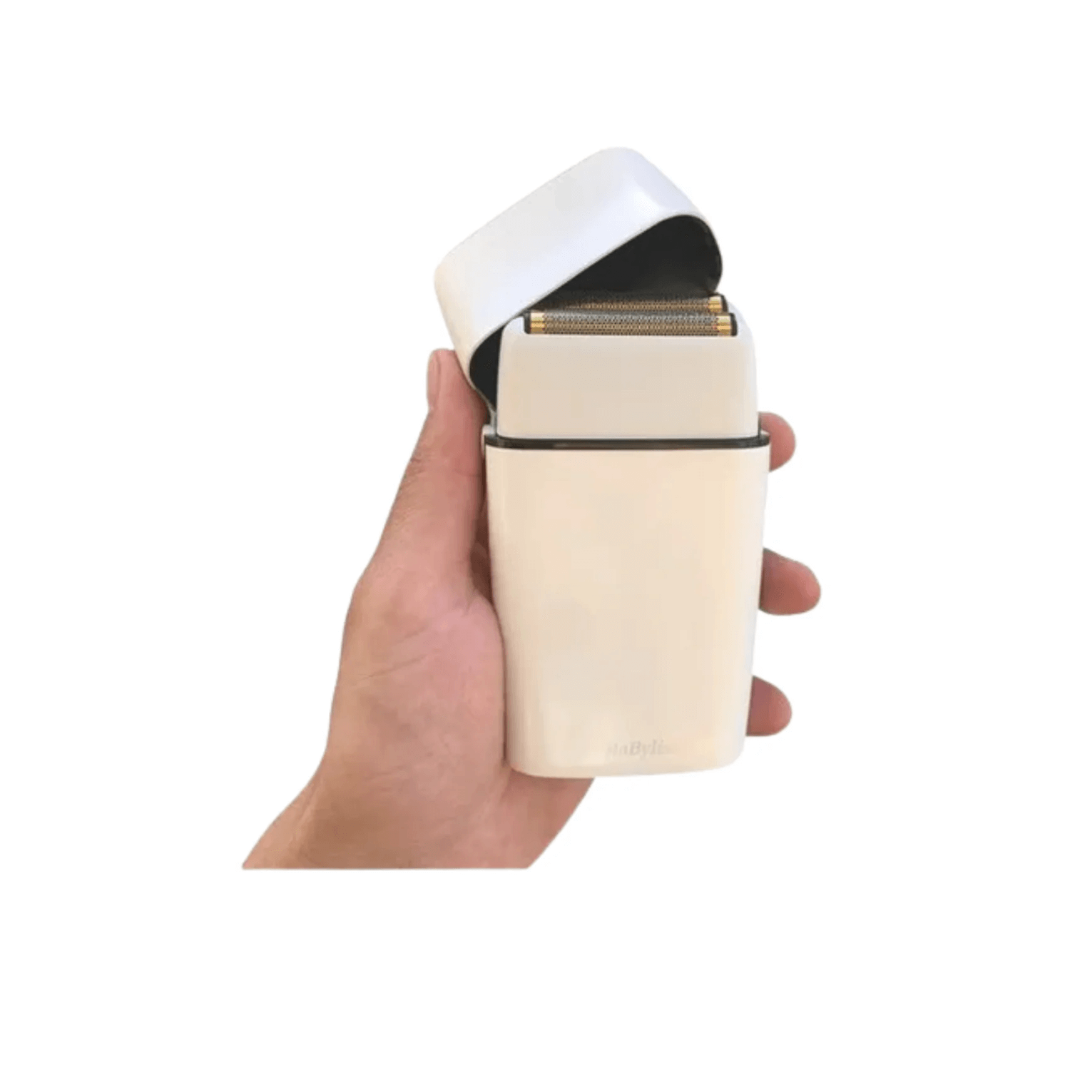 Afeitadora metálica doble hoja inalámbrica BabylissPro FX02 en mano, con tapa abierta.