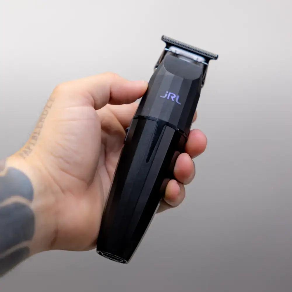 Cortadora JRL Onxy negra, perfecta para un corte de pelo preciso y elegante