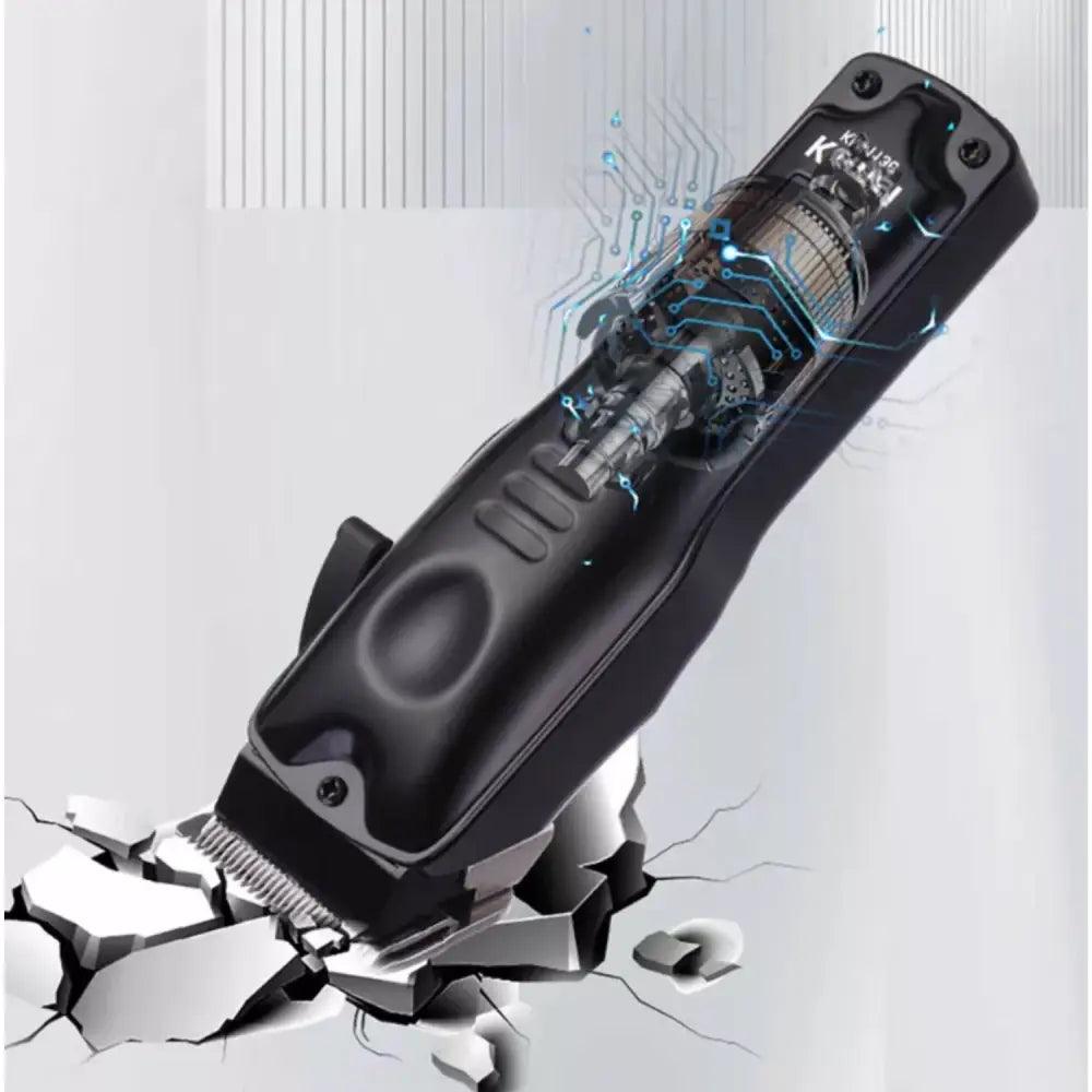 Cortadora de pelo Kemei KM-1136 mostrando clipper negro y mecanismos internos